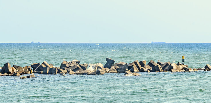 Stabilopods, rocks in the sea water, Black Sea, blue green water