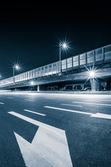 empty asphalt road through modern city in China.