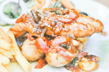 mixed sausage,sausage with gravy sauce topping