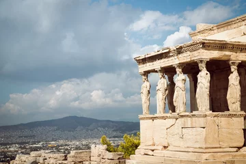 Sierkussen Acropolis, Erectheion, caryatids with panoramic view of the Athens, Greece © sola_sola