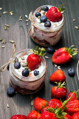 delicious dessert - yogurt with strawberries and blueberries