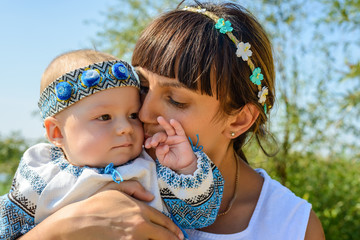 Portrait of a loving mother a baby daughter