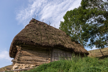 Fototapeta na wymiar Wooden hut in Mountains, Romanian countryside