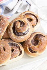 Homemade cream buns with chocolate