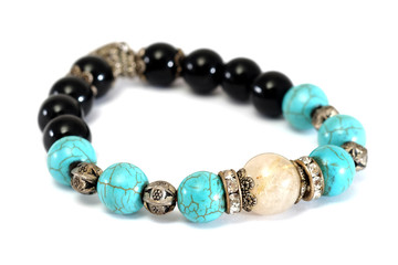 Rutile Quartz,Turquoise, Black Spinel Lucky stone bracelet with withe isolated background