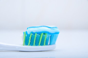 Toothbrush with blue toothpaste