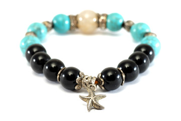 Rutile Quartz,Turquoise, Black Spinel Lucky stone bracelet with withe isolated background