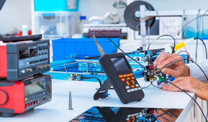 Adjusting an industrial robot with a CNC computer control