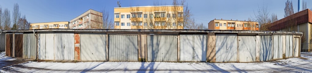 old garage doors in a row in the GDR