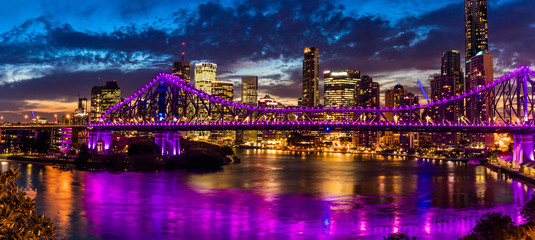 Night time panorama of Brisbane city with Story Bridge