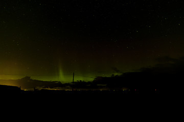 Northen lights seen over Scottish sea neat Edinburgh 