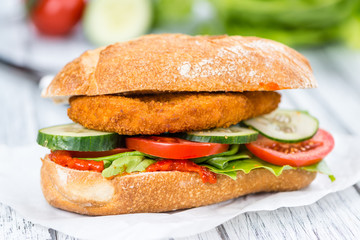 Chicken Schnitzel on a bun (selective focus)