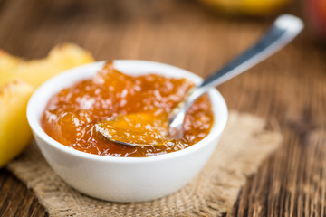 Wooden table with Peach Jam