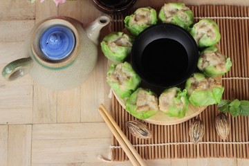 Chinese steamed dumpling with sauce is delicious.