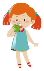 Little girl eating green apple