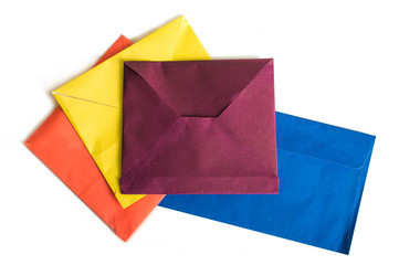 Multi-colored envelopes. On white, isolated background.