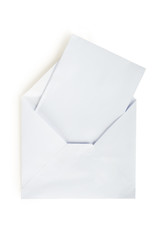 White envelope with a letter. On white, isolated background.