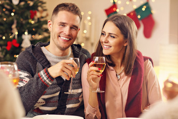 Group of friends celebrating Christmas