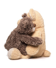 Two Teddy bears hugging.