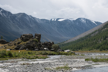 Wildlife Altai. The river, mountains and sky with clouds in summ