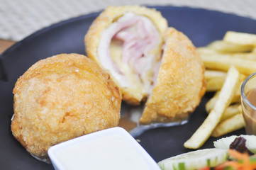 Chicken Cordon Bleu with French fries