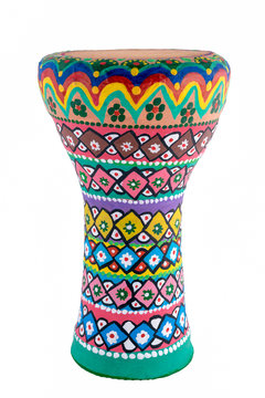 Front view of a colorful painted goblet drum (also chalice drum), is a single head membranophone with a goblet shaped body
