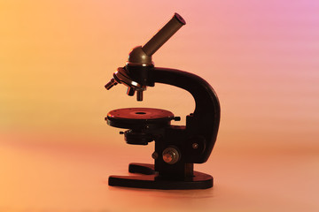 Microscope on a colored background