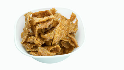 Crunchy fried cookies rolled in sugar and minced black pepper glaze , Thai traditional snacks isolated on white background