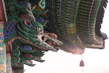 Fototapeta premium Traditional Asian wooden temple with Dragon over the main Entrance