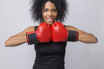 Woman boxer from Africa in black tank top