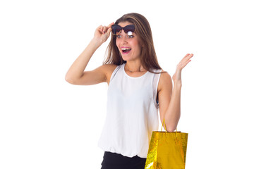 Woman with sunglasses and shopping bag