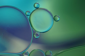 Oil drops on a water surface - abstract rainbow colored macro (343)