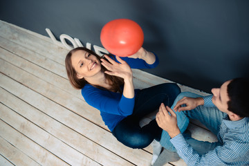 love couple sitting on the floor in the room