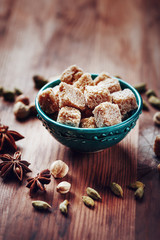 Food background with brown sugar and spices