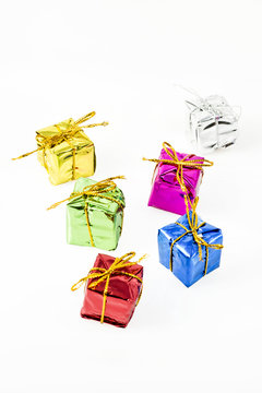 mini gifts on white background