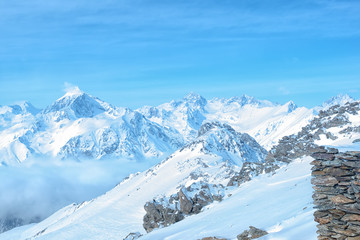 Fototapeta na wymiar amazing winter day landscape with snow covered peaks of Caucasus