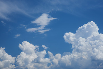 Naklejka na ściany i meble Cirrus and cumulus clouds