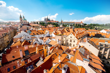 Fototapeta premium Cityscape aerial view on the Lesser town with castle hill and churches in Prague city