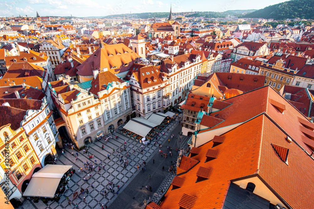 Wall mural top cityscape view on the old town square from the clock tower during the sunset in prague