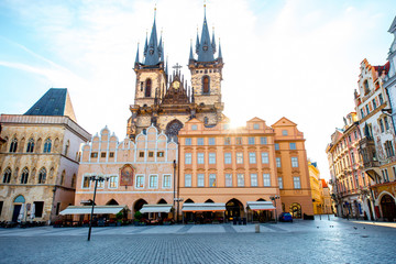 View on the old town square with famous Tyn cathedral on the sunrise in Prague