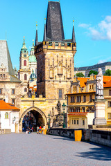 View on the Lesser town with bridge tower and saint Nicholas church in Prague city