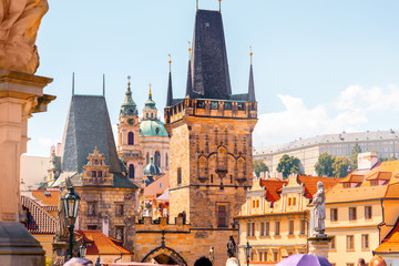 View on the Lesser town with bridge tower and saint Nicholas church in Prague city