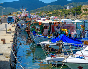 Fototapeta na wymiar pier with yachts and fishing boats