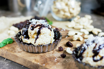 Raw dessert with ice cream. Selective focus. Blurred background. Close up