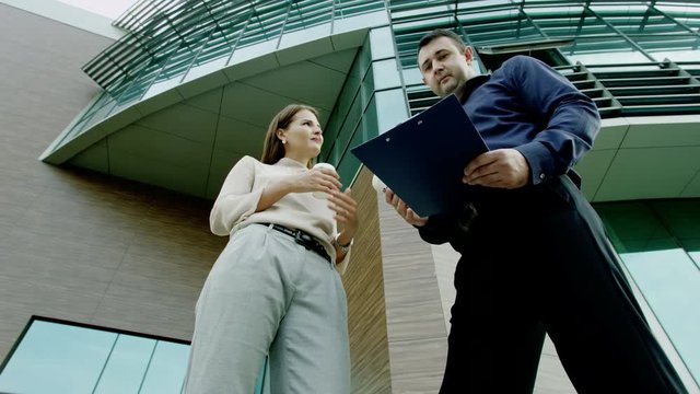 Colleagues discussing a project