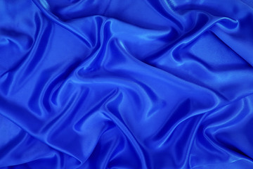Obraz premium blue silk or blue satin textile fabric texture background