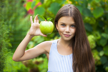 Picture of beautiful girl with green apple