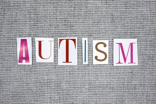 autism word cut from newspaper