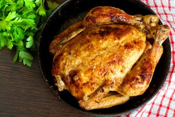 baked chicken,Style rustic.Top view, space for text.