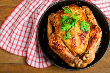 baked chicken,Style rustic.Top view, space for text.